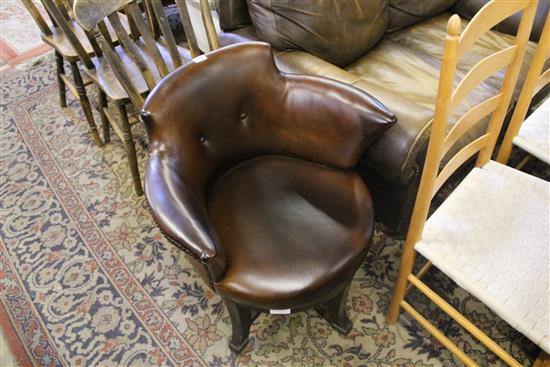 Leather upholstered swivel desk chair